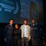 Attendees on stage at an American Black Film Festival Pop-Up Tour event