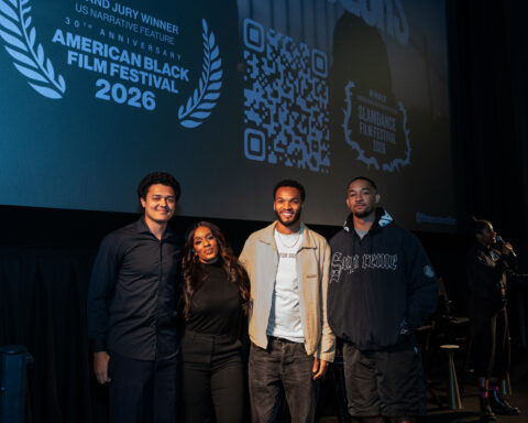 Attendees on stage at an American Black Film Festival Pop-Up Tour event