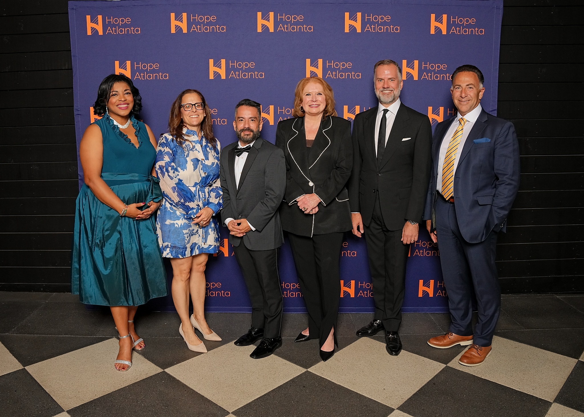 Diverse group of guests at a Heroes for Hope gala event